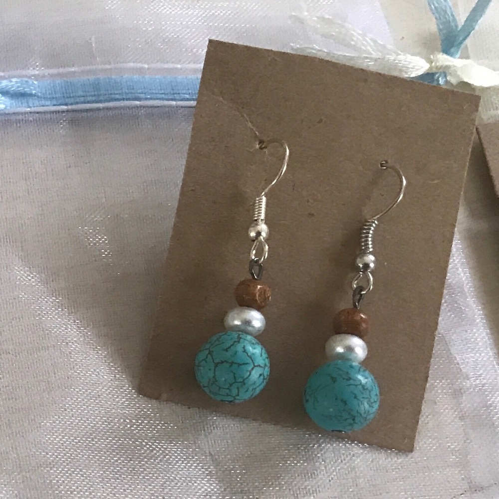 Eagle egg dangly earrings